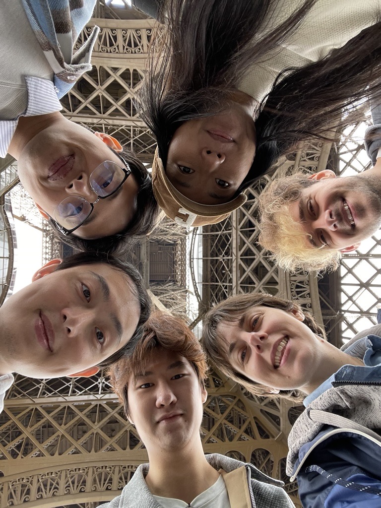 Group photo in front of the Eiffel Tower
